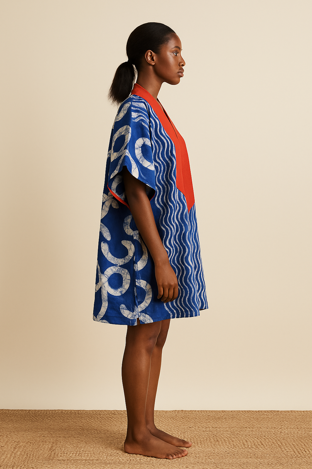 Abeokuta Current Short Bubu – Indigo Hand-Dyed Mini Kaftan with Fiery Red Accent
